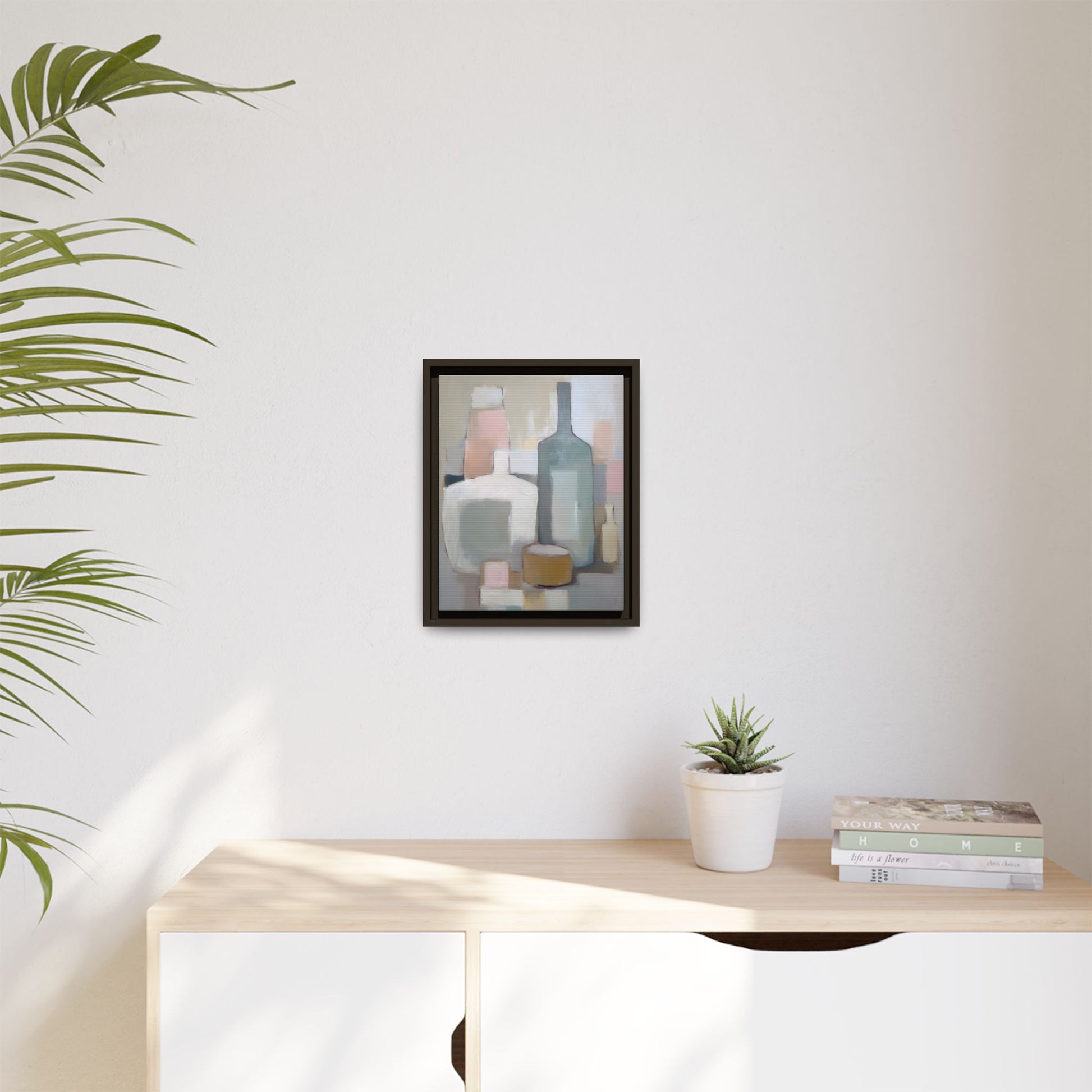 Modern Abstract Bottle Still Life Wall Art – Framed Canvas in Soft Pink, Blue, and Beige displayed on a minimalist wall.