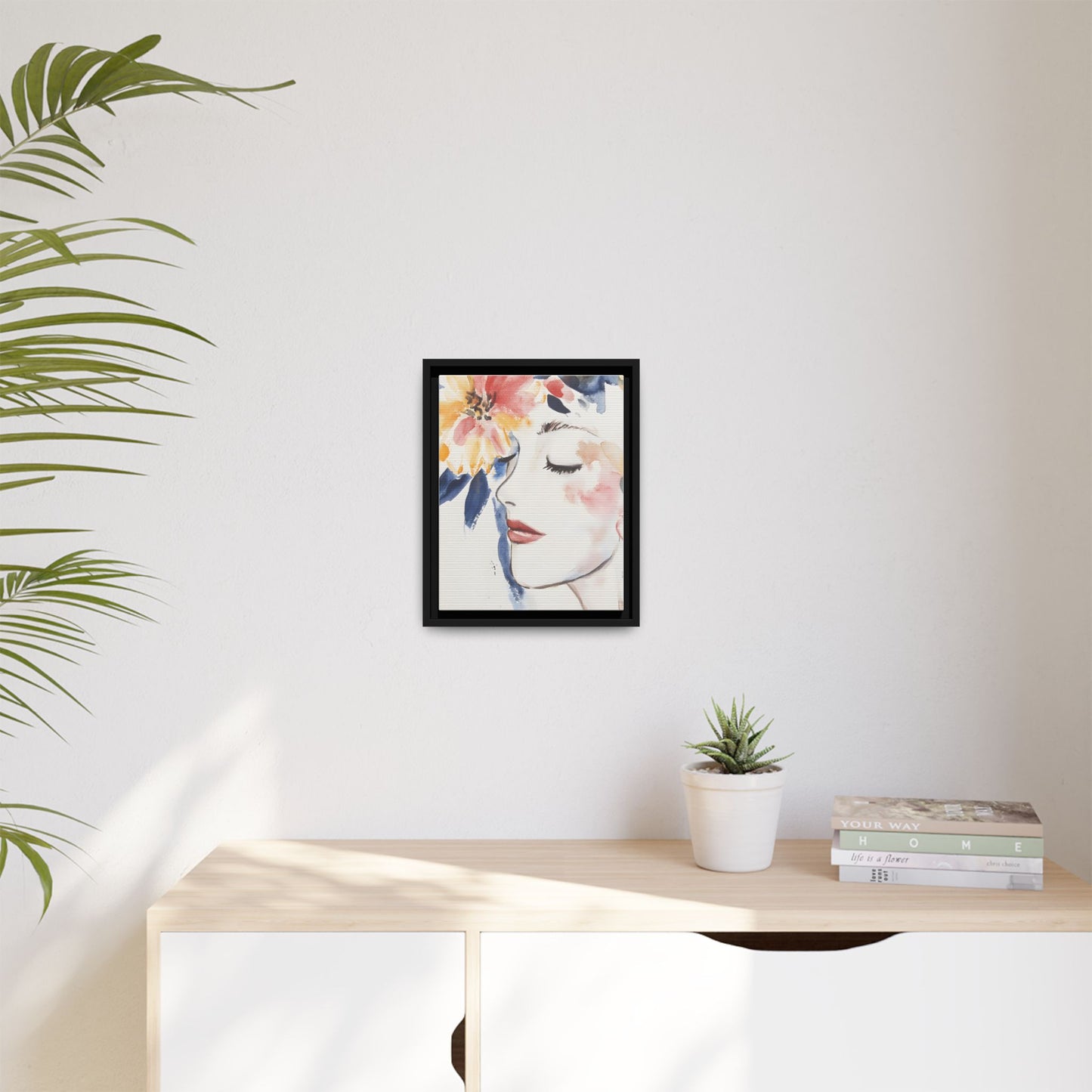 Multi-Color Framed Matte Canvas Art - Floral Face Portrait on wall with plants and books