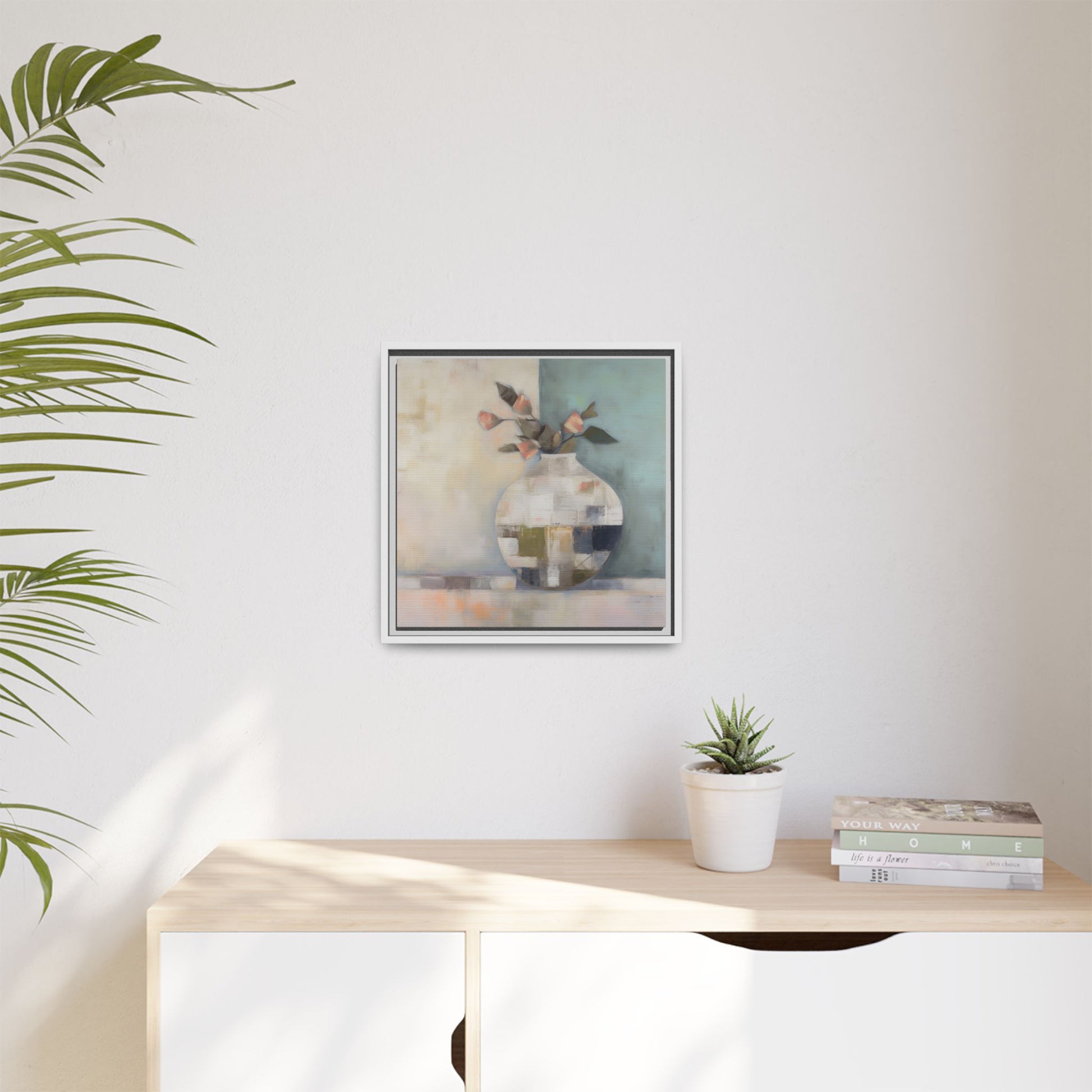 Geometric Floral Still Life Wall Art – Framed Abstract Canvas with Vase and Blush Pink Buds on a modern living room wall.