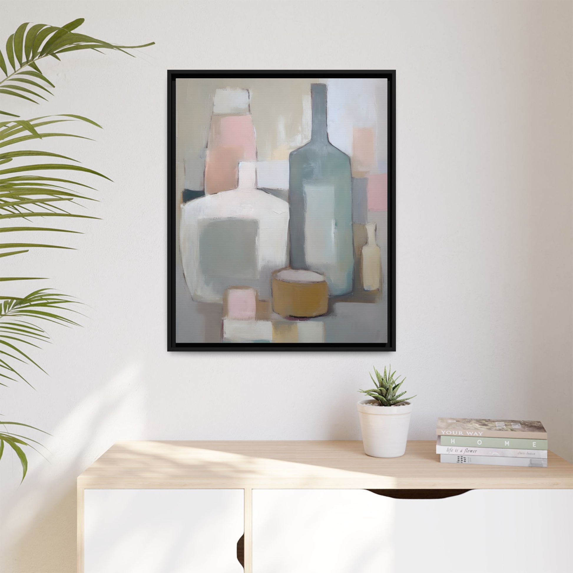 Modern Abstract Bottle Still Life Wall Art – Framed Canvas in Soft Pink, Blue, and Beige displayed in a stylish interior.