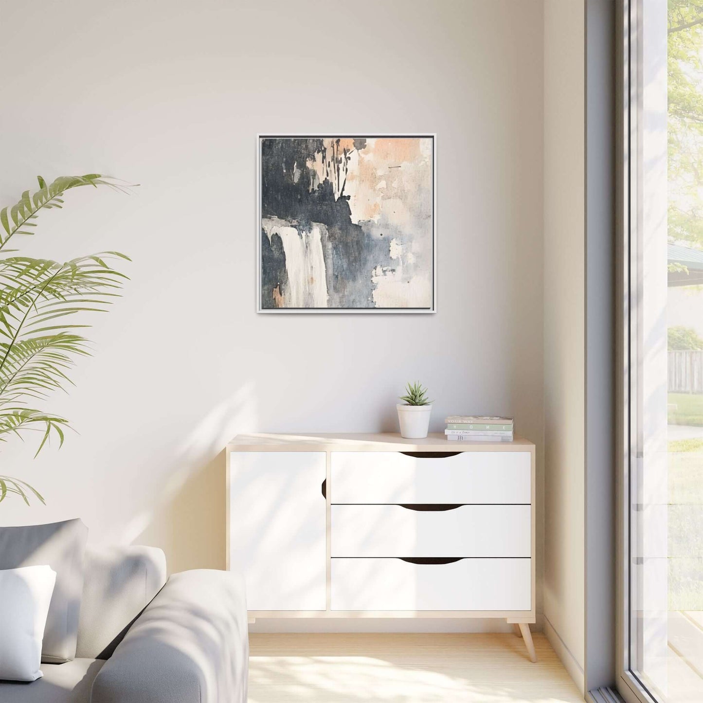 Framed waterfall art print on matte canvas in modern living room decor, showcasing nature-inspired interior design.