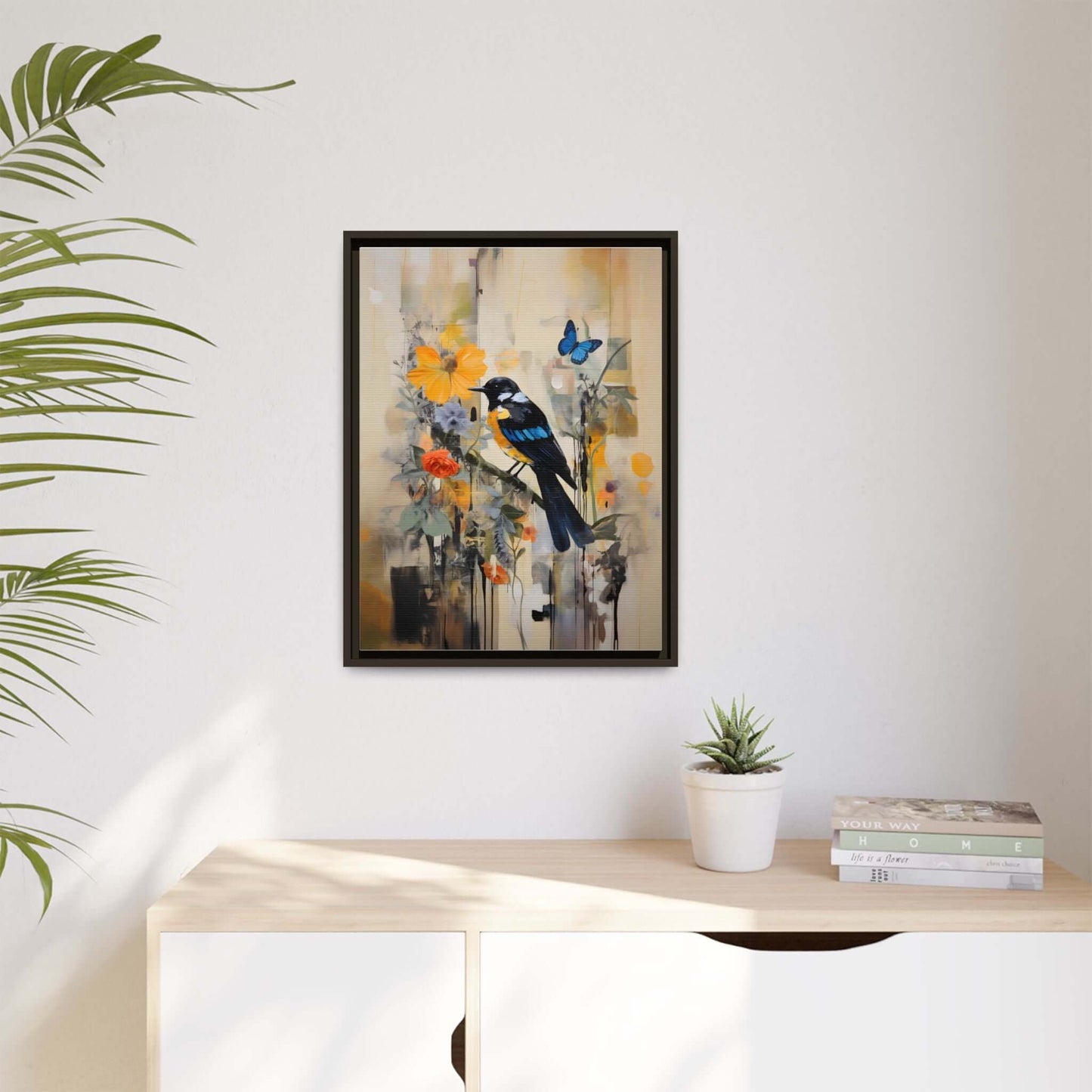 Framed colorful bird and butterfly canvas art on wall, featuring vibrant floral design, perfect for home decor.