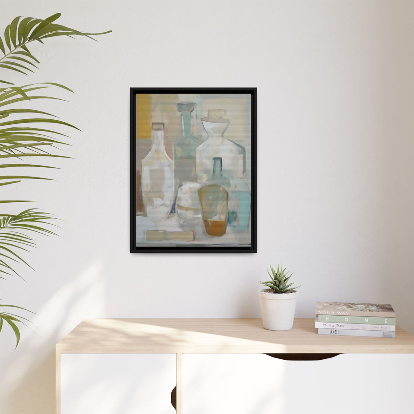 Modern Still Life Wall Art – Neutral Bottles Framed Canvas in Beige, Aqua & Amber hanging on a minimalist wall in a serene setting.