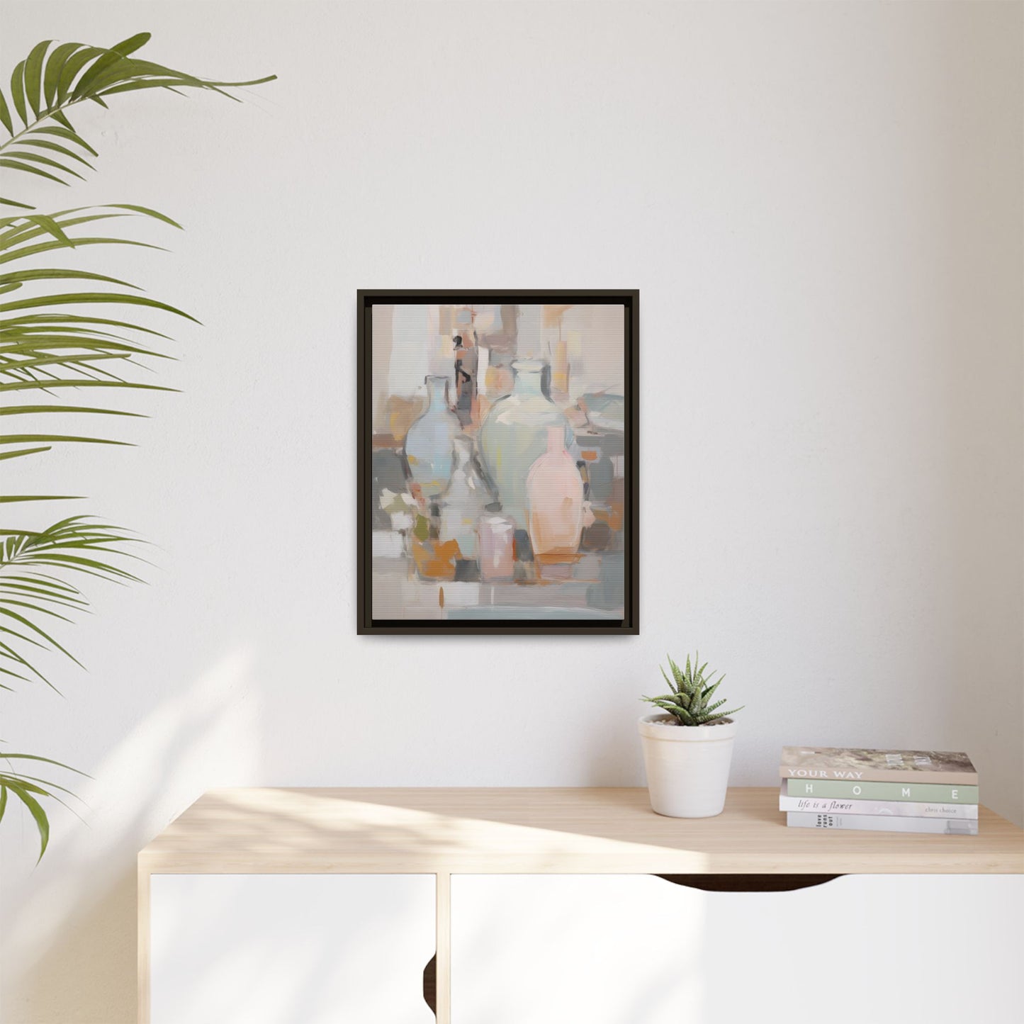 Modern Abstract Still Life Wall Art – Colorful Framed Canvas with Blue, Pink & Terracotta Bottles hanging on a white wall.