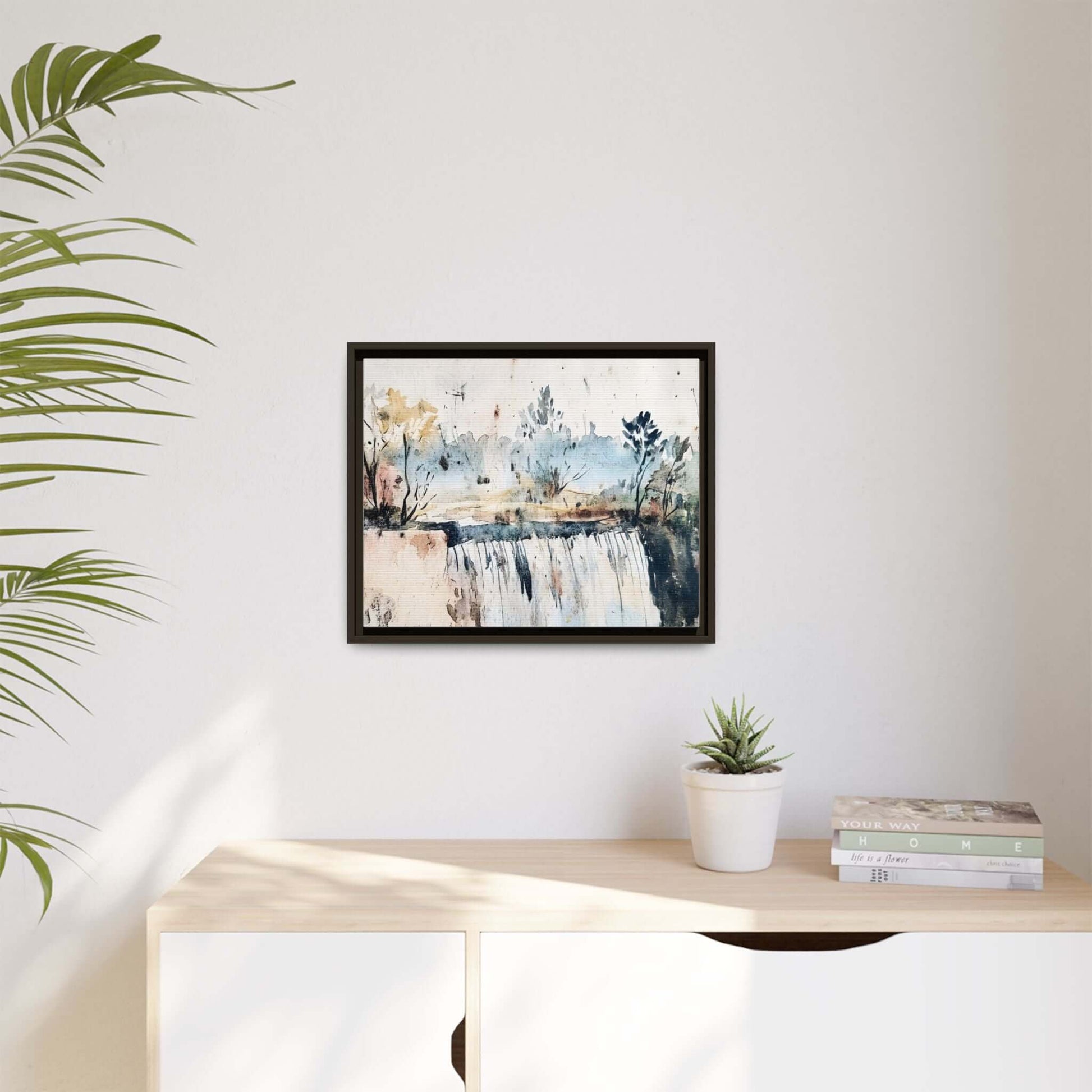 Framed watercolor wall art of serene landscape decor, showcasing a tranquil scene in a minimalist room setting above a console table.