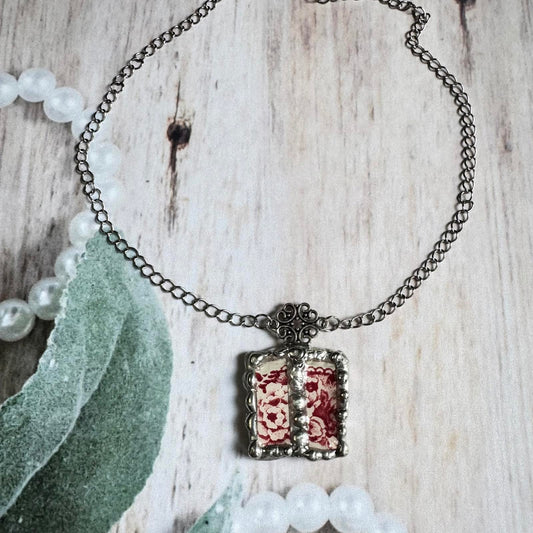 VTG Broken China Floral Pendant Necklace w/ Silver Tone Chain and Decorate Charm featuring red floral design on rustic background.