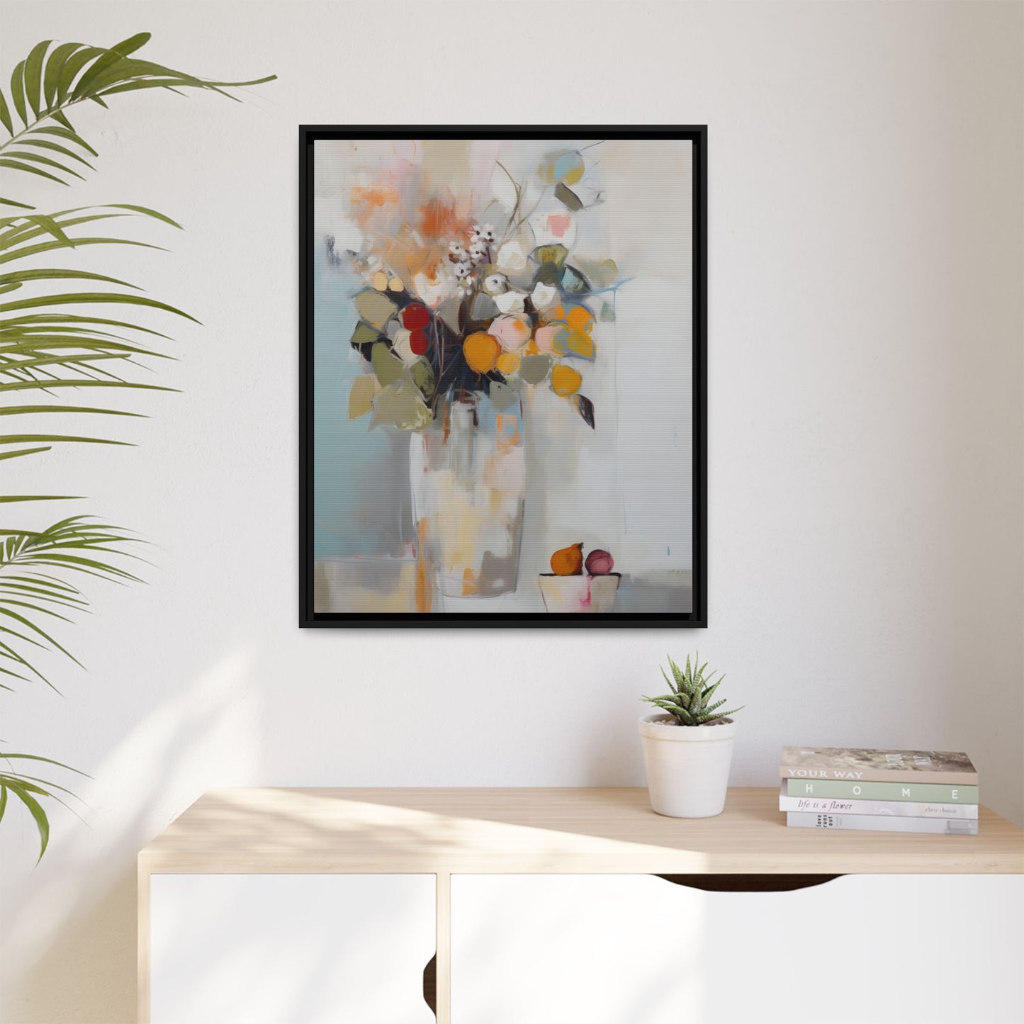 Colorful Floral Still Life Wall Art – Framed Abstract Canvas with Bright Blooms and Fruit Bowl hanging on white wall above table.