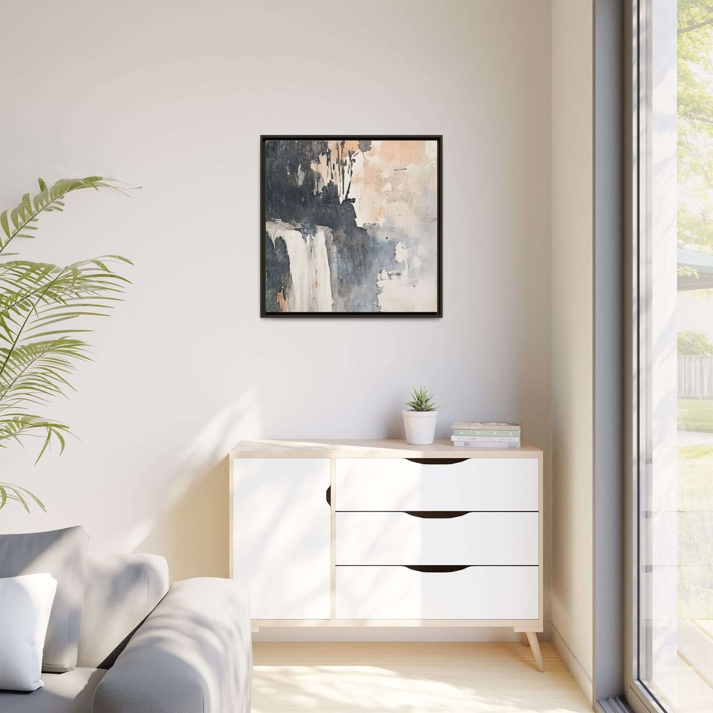 Framed waterfall art print on matte canvas, 30" x 30" square, displayed in modern living room decor.