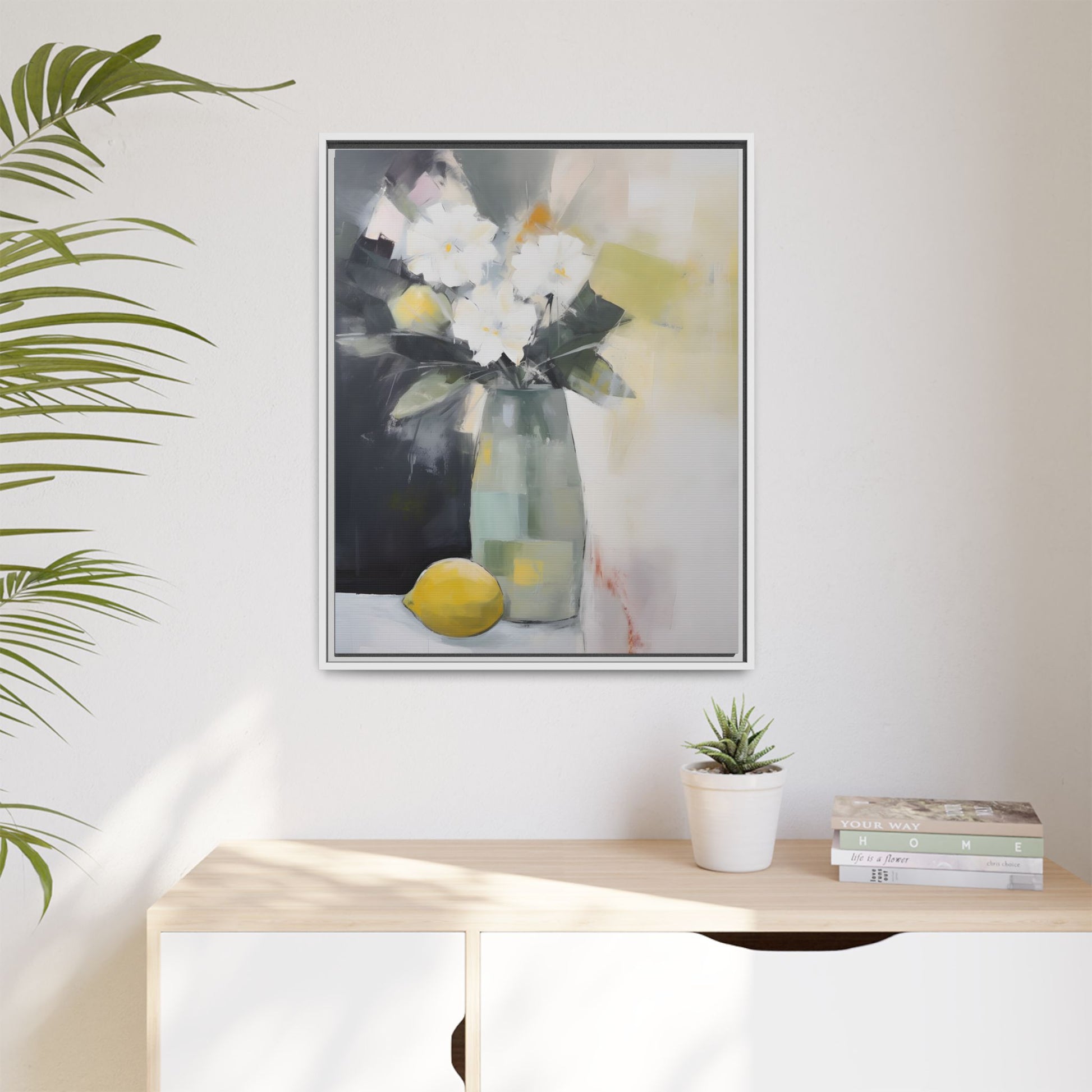 Modern Floral Still Life Wall Art – Framed Canvas with White Flowers and Lemon in Soft Green Vase displayed on a wall