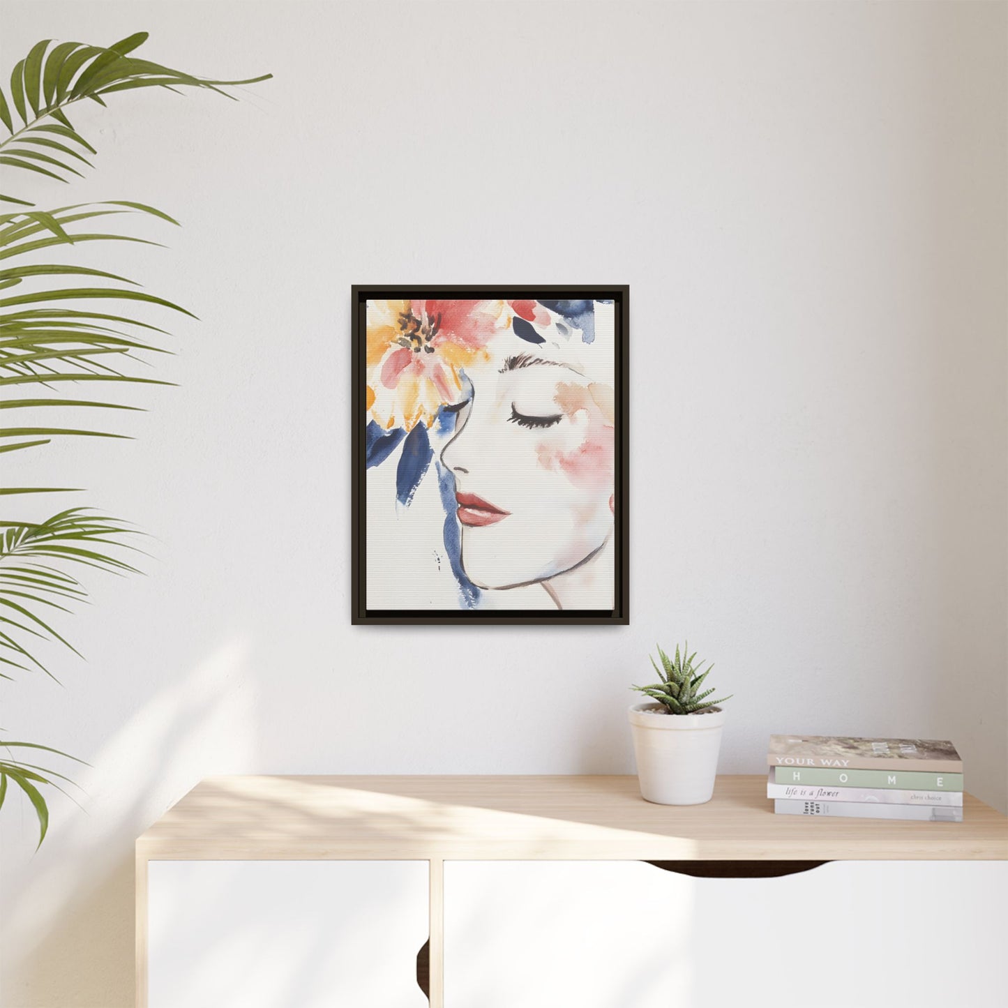 Multi-Color Framed Matte Canvas Art - Floral Face Portrait displayed in modern living room.