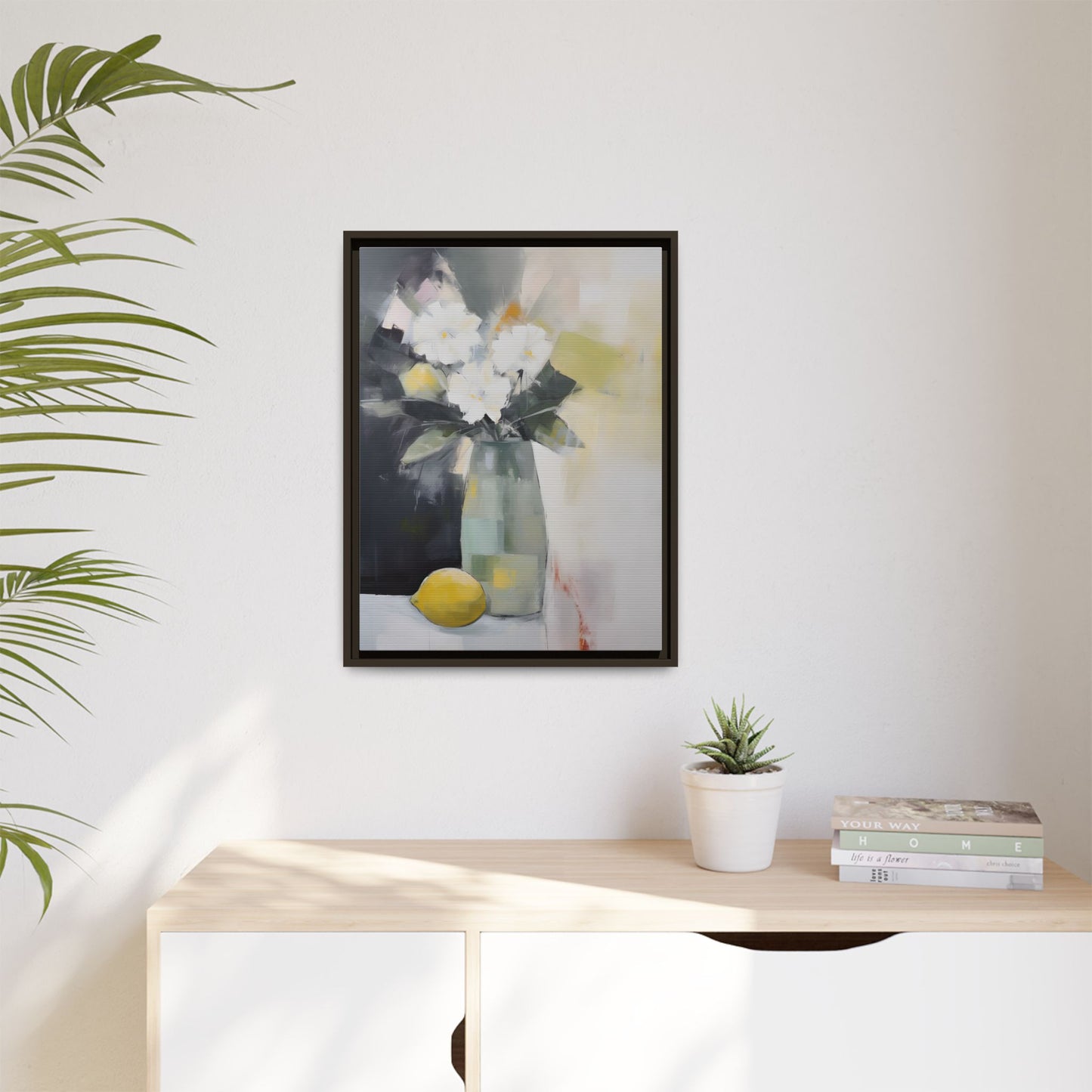Modern Floral Still Life Wall Art – Framed Canvas with White Flowers and Lemon in Soft Green Vase, perfect for home decor.