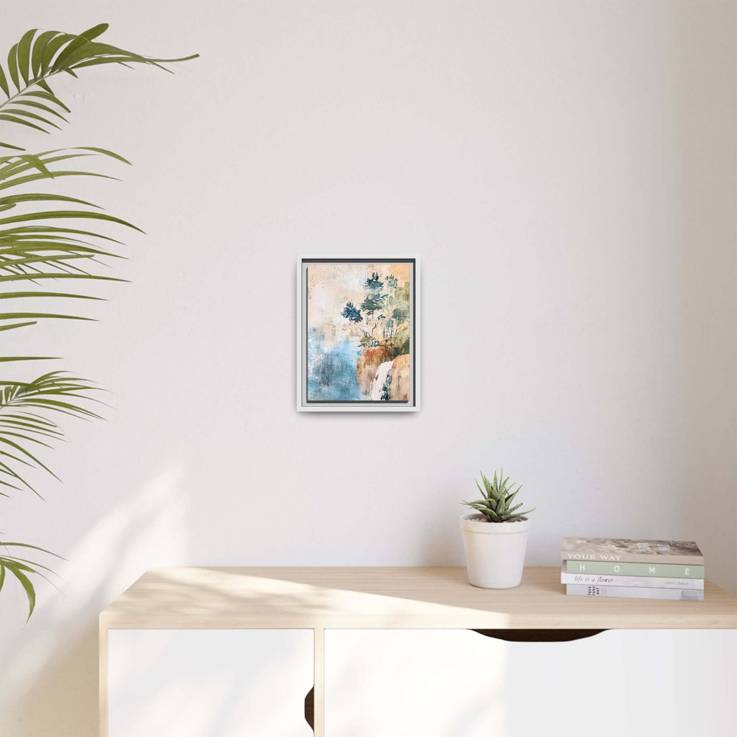 Alt Tag: Framed watercolor canvas print of a misty forest landscape hung on a wall above a minimalist console table, creating a serene atmosphere.