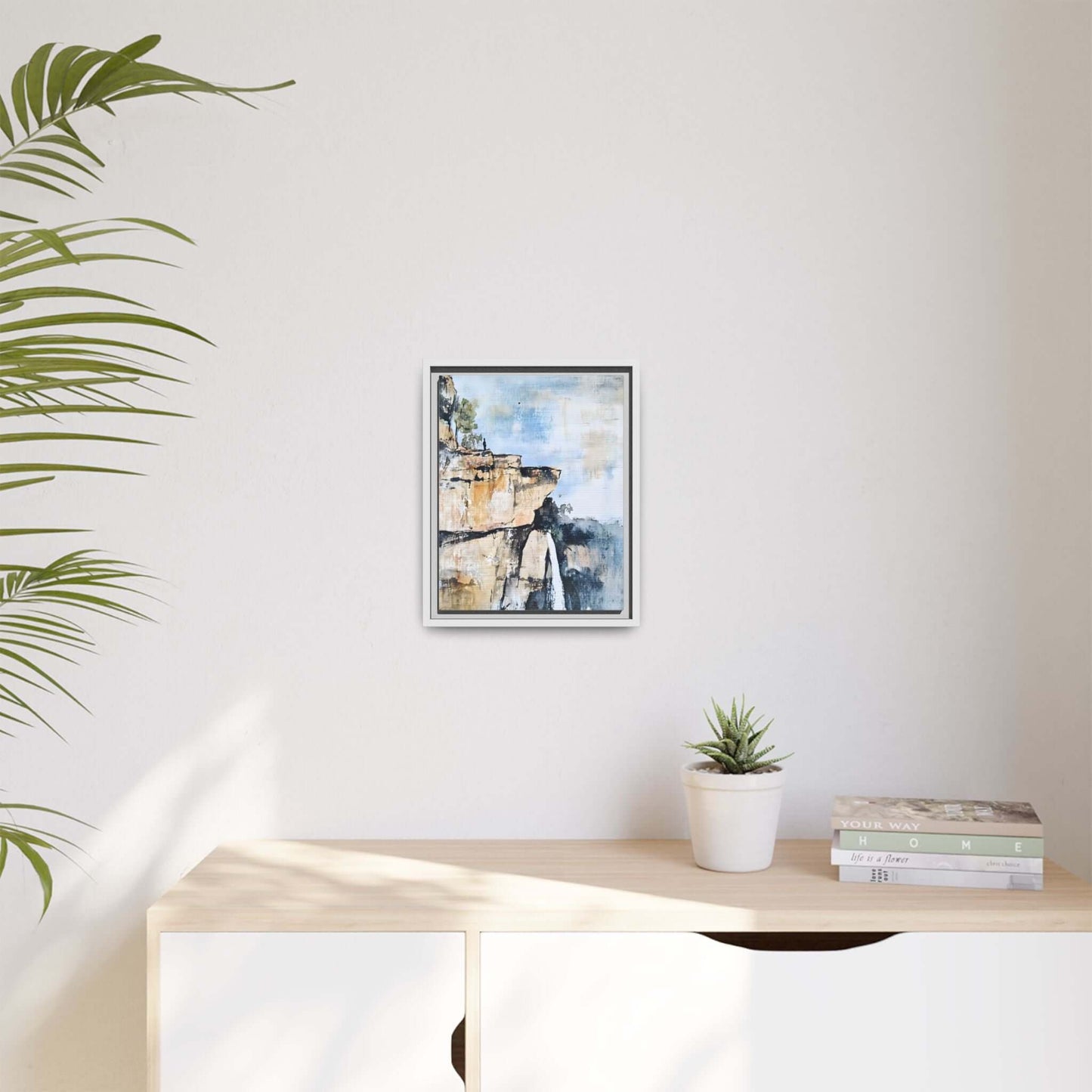 Framed canvas wall art featuring impressionistic waterfall landscape, enhancing room serenity with its calming and vibrant design.