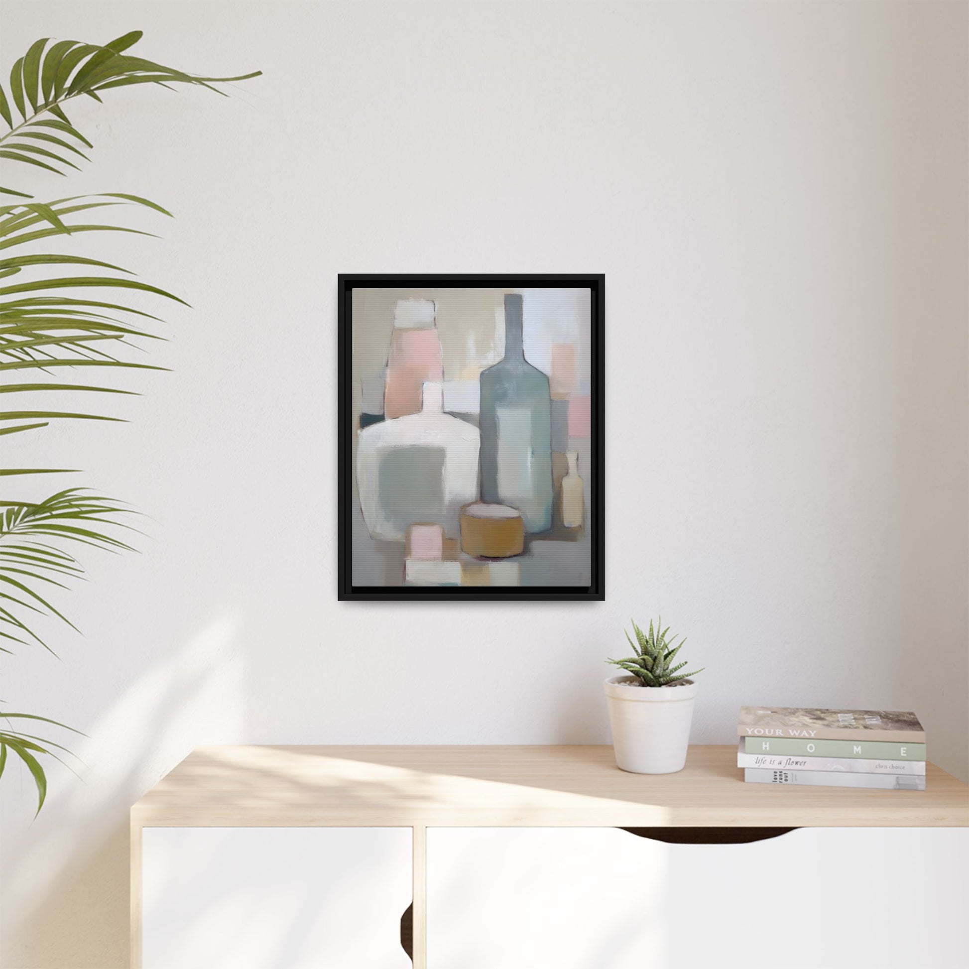 Modern Abstract Bottle Still Life Wall Art – Framed Canvas in Soft Pink, Blue, and Beige displayed in a minimal living space.