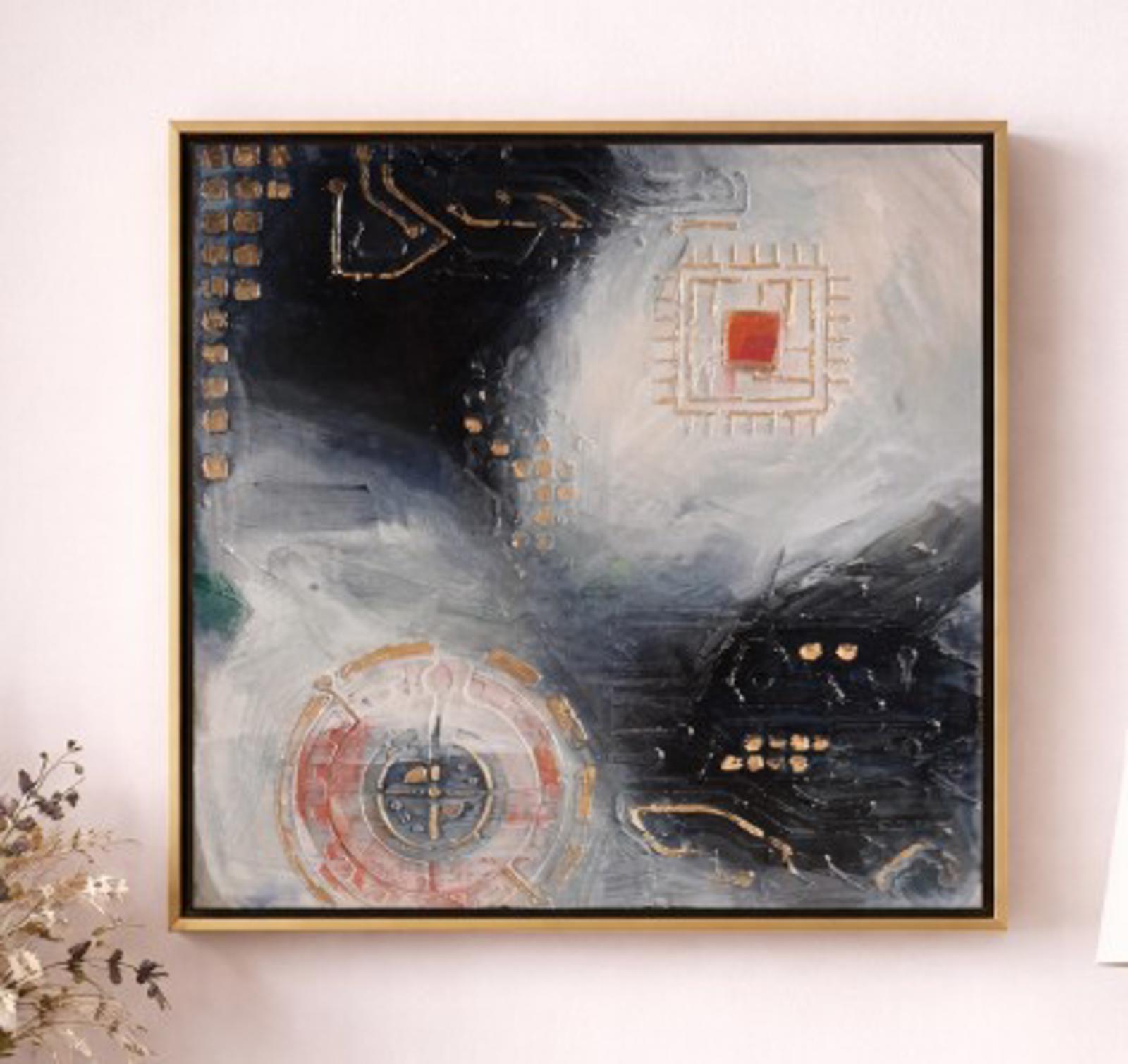 Abstract painting with geometric shapes on a white wall